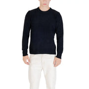 Navy blue crew neck sweater with ribbed cuffs and hem, likely made of cotton or wool.