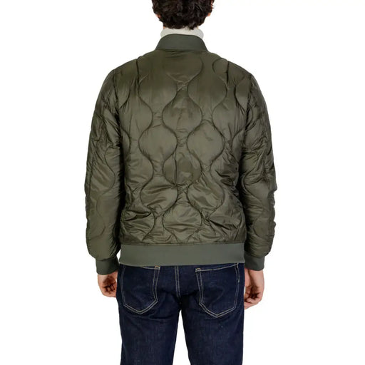 Olive green quilted bomber jacket with a high collar and zipper closure.