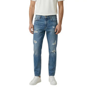 Gianni Lupo Jean en denim bleu clair pour homme, délavage moyen, avec détails déchirés et usés sur les cuisses et les genoux.