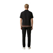 Gianni Lupo Chemise homme noire à manches courtes à pois blancs et ourlet brodé coloré