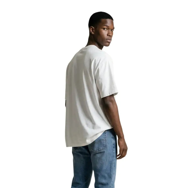 Gianni Lupo T-shirt homme blanc oversize à col rond, 100 % coton, avec de subtiles coutures latérales noires.