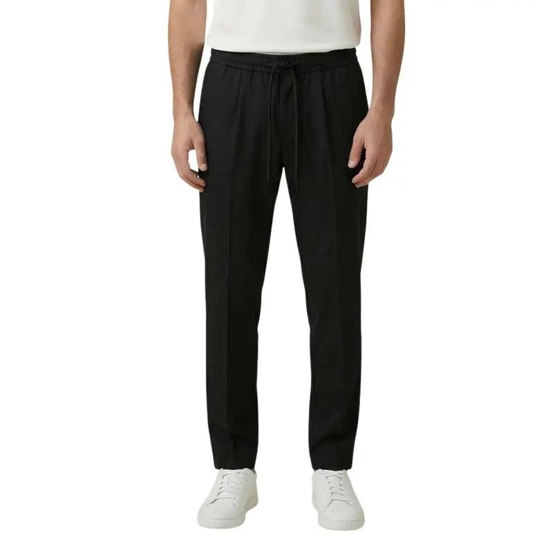 Pantalon noir à cordon de serrage, coupe droite élégante et plis discrets à la taille. gianni lupo en polyester viscose