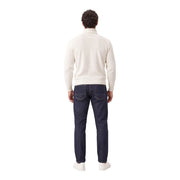 Gianni Lupo Pull à col roulé pour homme en maille côtelée crème, porté par un mannequin avec un jean bleu foncé (vue de face)