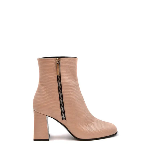 Bottines Giuseppe Zanotti en cuir beige à motif crocodile, talon bloc et fermeture éclair dorée