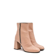 Bottines Giuseppe Zanotti en cuir beige façon crocodile, à talon bloc épais et fermeture éclair noire