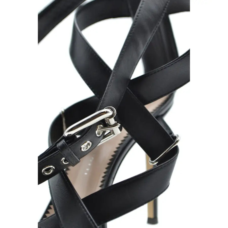 Sandales à talons aiguilles Giuseppe Zanotti en cuir noir avec boucle et détails métalliques argentés et fermeture éclair