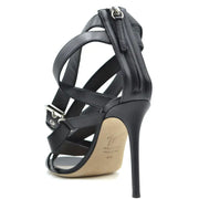 Sandales à talons aiguilles en cuir noir Giuseppe Zanotti, ornées d'une fermeture éclair et d'une boucle argentées. Modèle à brides et talons hauts.