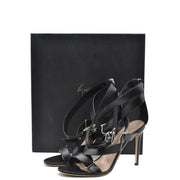 Sandales à talons aiguilles Giuseppe Zanotti en cuir noir, ornées de boucles argentées et d'une fermeture éclair, pour une allure élégante.