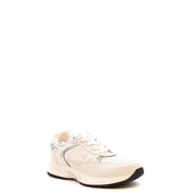 Giuseppe Zanotti cream-colored slip on sneakers with silver metallic accents and black rubber sole in leather nylon