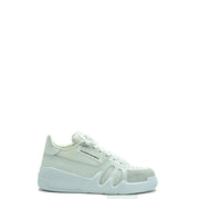 White puma sneakers with mesh accents and chunky sole.