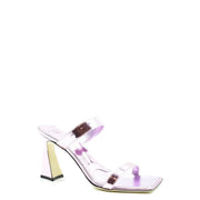Giuseppe Zanotti women pink leather block heel sandals featuring a shimmering lavender metallic mule with geometric heel