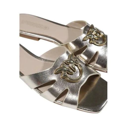 Gold metallic slide sandals from Pinko Women’s Leather Slippers for elegant spring/summer