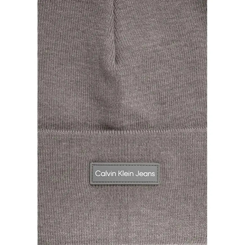 Gray knit beanie with a logo patch from Calvin Klein for casual winter wear