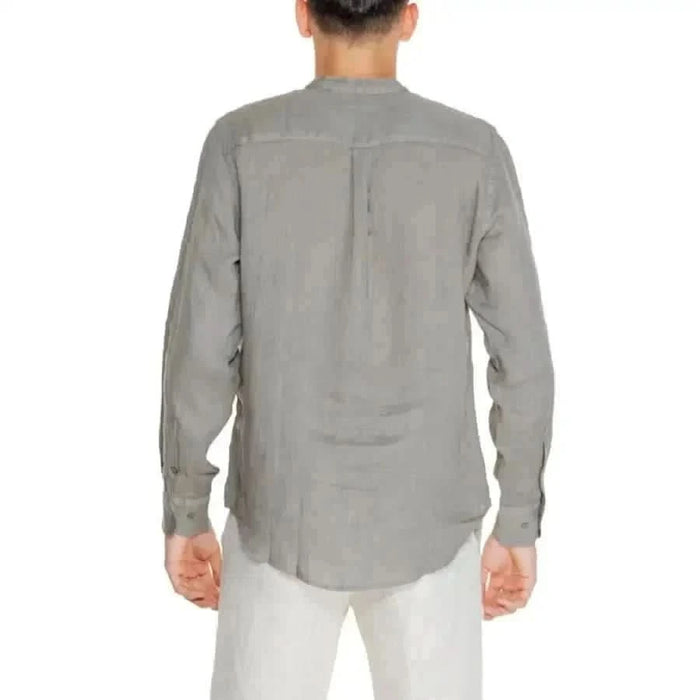 Back view of person wearing gray Borghese-Men long-sleeved shirt, displaying elegant fit