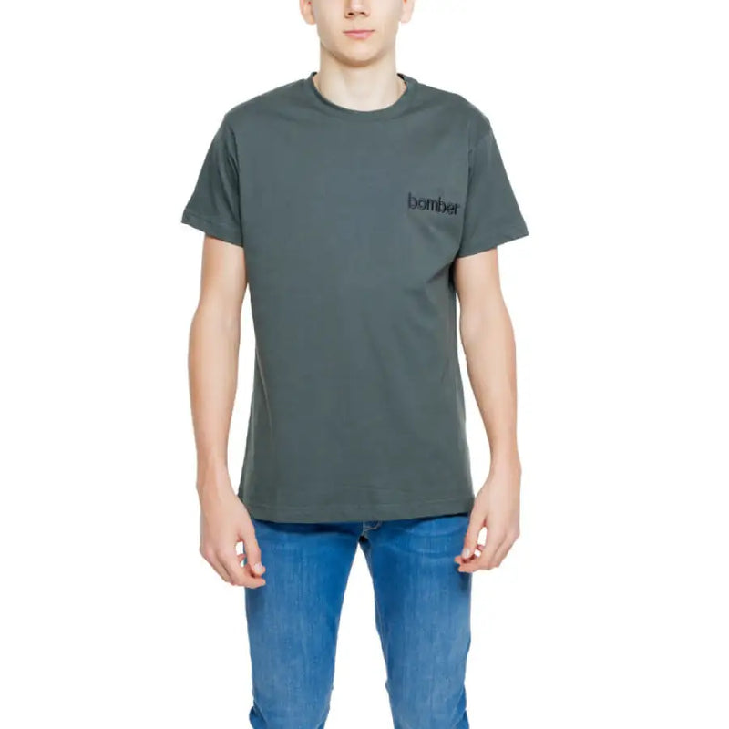 Gray t-shirt paired with jeans from Hydra Clothing Men’s Black Cotton T-Shirt with Bomber Logo