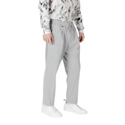 Gray drawstring trousers displayed on a mannequin showcasing comfortable casual wear