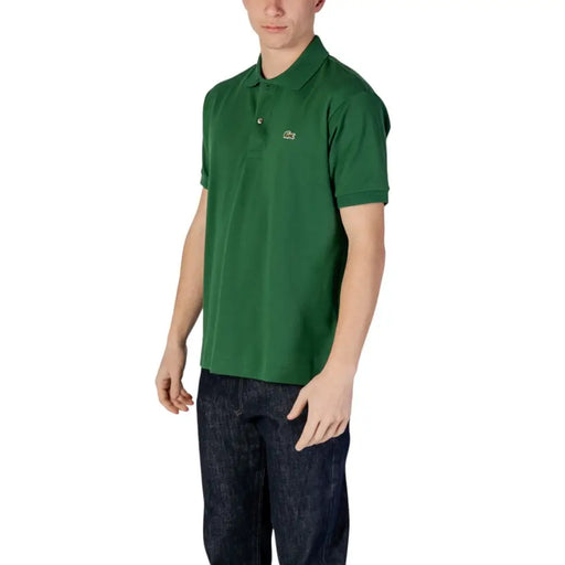 Green Lacoste polo shirt with classic collar and embroidered crocodile logo on chest made of breathable cotton
