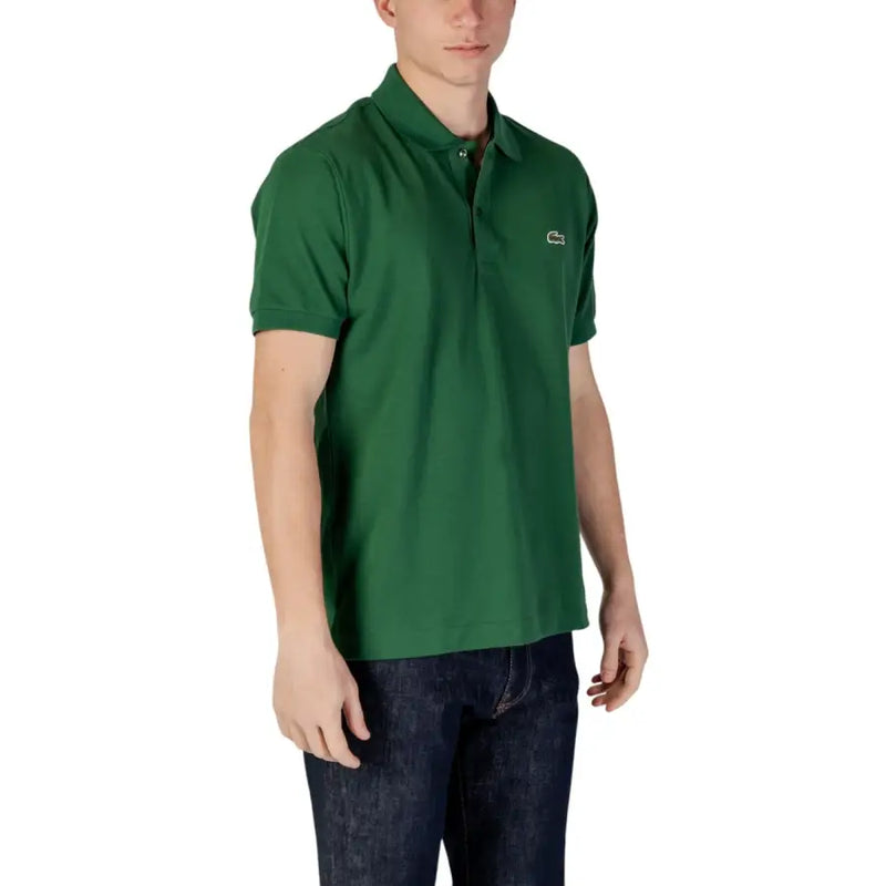 Green Lacoste polo shirt with classic collar and signature crocodile logo on the chest