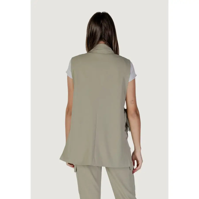 A sleek olive-green sleeveless vest by B.young with a high collar, v-neck, subtle side slits, and front pockets