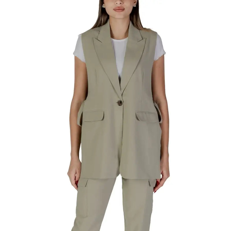 Beige sleeveless blazer with single button closure and flap pockets featured alongside green sleeveless v-neck gilet by B.young