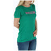 Green T Shirt with Pink Lettering displaying a stylish and vibrant design