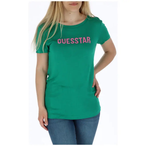 Green T Shirt with Pink Lettering displaying stylish casual apparel
