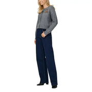 Women’s dark blue high-waist wide-leg jeans paired with Grey Printed Long Button Front Round Neck Women Cardigan