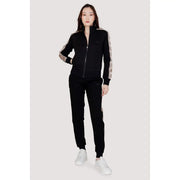Guess Active Pantalon en coton noir pour femme, à rayures blanches et beiges, idéal pour l'automne et l'hiver.