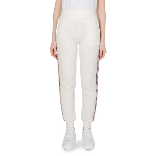 Cream-colored guess active high-waisted cotton joggers with black and white patterned side stripes for fall winter