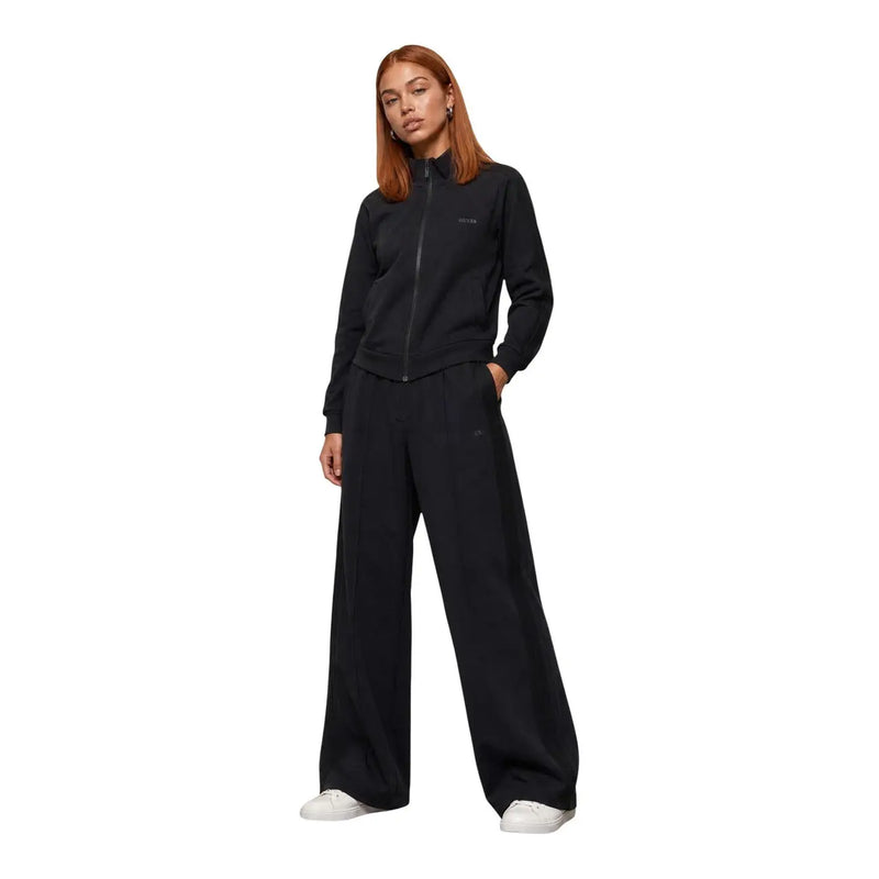 Noir Guess Active Pantalon droit Lyra pour femme, assorti à une veste de survêtement zippée ornée d'un logo discret.