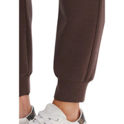 Guess active Pantalon de jogging long Olympia pour femme, marron, en mélange modal, avec tissu doux et extensible et ourlets côtelés.