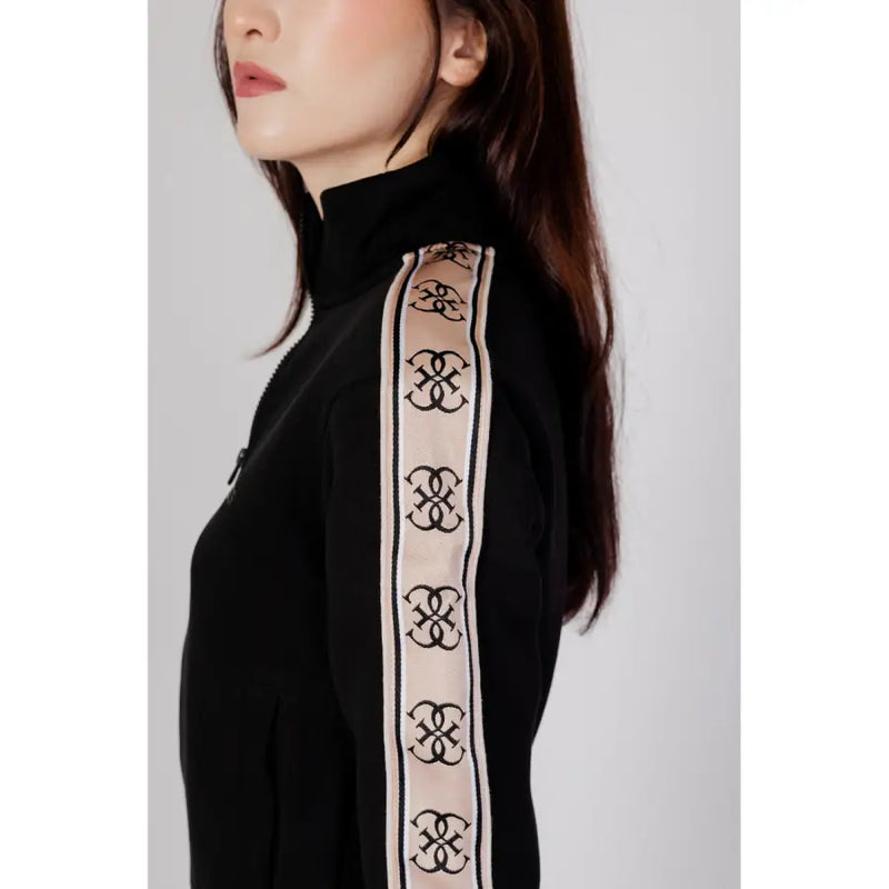 Guess Active women’s black zip sweatshirt 100 percent cotton with cream vertical stripe and interlocking logo patterns on sleeve