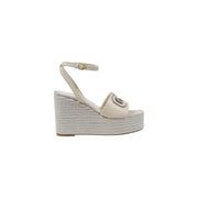 Guess beige wedge shoes with cream platform, woven espadrille sole, ankle strap, and gold-tone buckle detail