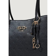 Black Guess polyurethane tote bag with embossed logo pattern and metallic hardware accents featuring multiple pockets