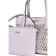 White leather Guess tote bag with geometric cut-out pattern and gold-tone logo in Lilac polyurethane handbag style