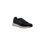 Guess Baskets noires pour homme, style slip-on, en daim et synthétique, avec semelle en caoutchouc crème, pour une tenue décontractée.
