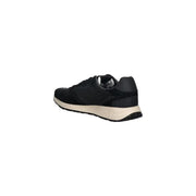Guess Baskets noires pour homme, style slip-on, en daim noir avec semelle intermédiaire crème et semelle extérieure en caoutchouc noir.