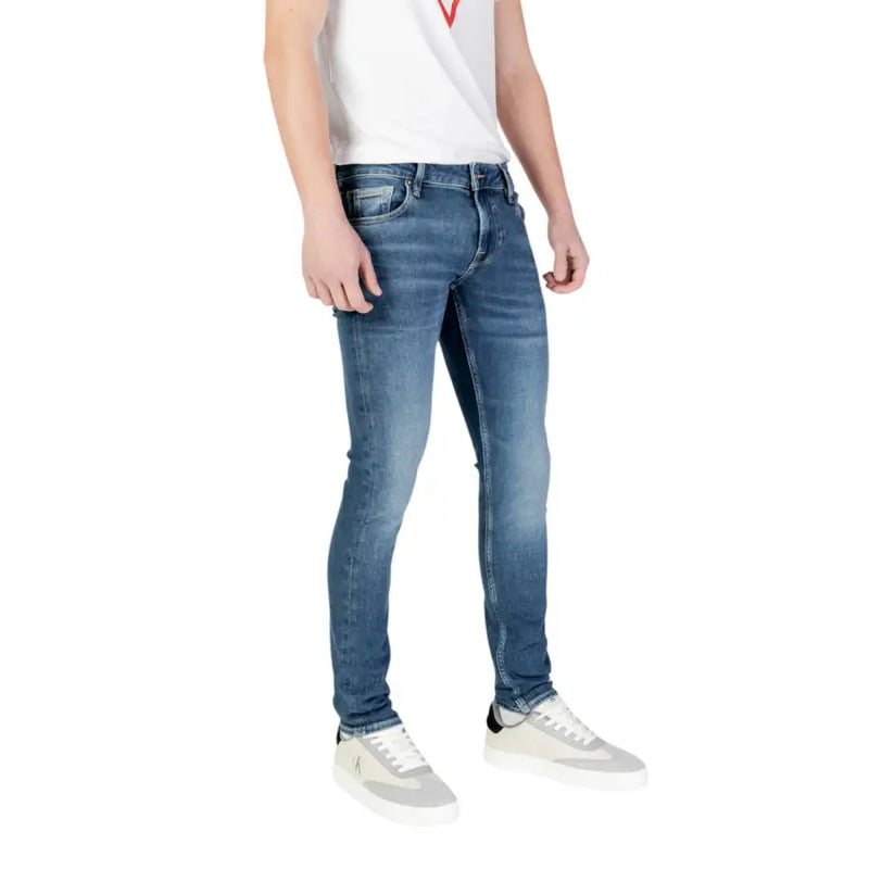 Guess men blue slim fit denim jeans with faded wash classic stitching and belt loops from spring summer collection