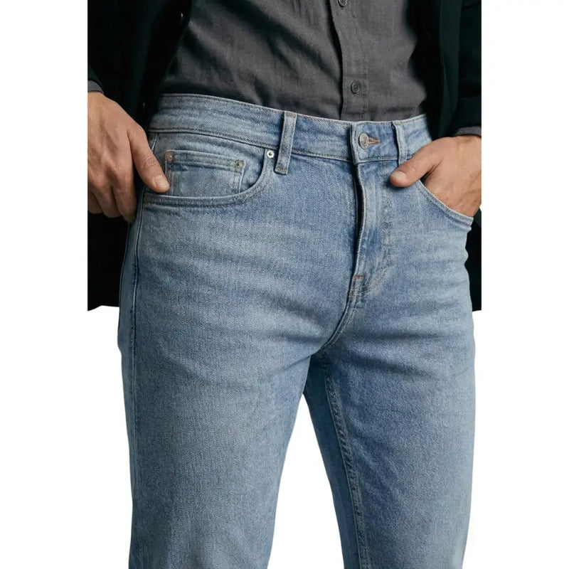 Lavage léger guess Jean homme bleu en coton stretch, coupe classique cinq poches et délavage subtil pour un effet usé