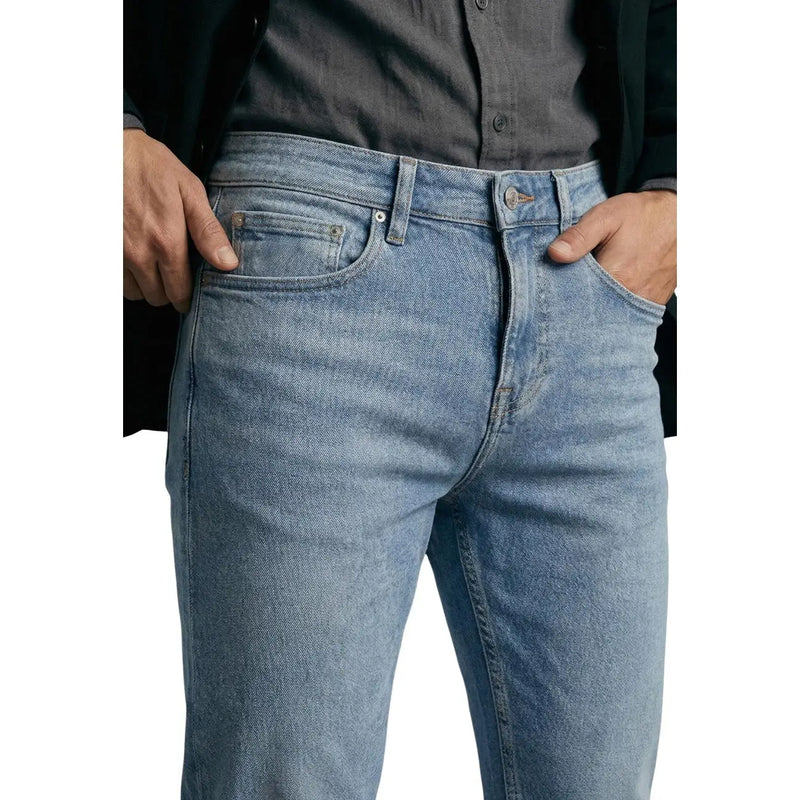Light-wash guess men jeans blue cotton stretch with classic five-pocket design and subtle fading for a worn-in look