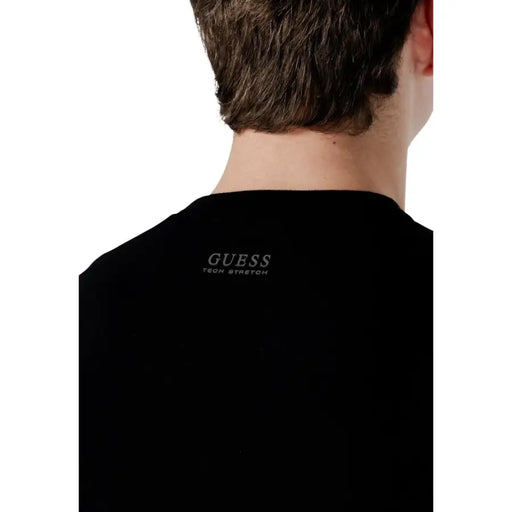 Noir Guess Pull à manches longues Kadir Tech pour homme, en maille extensible avec broderie argentée à l'encolure.