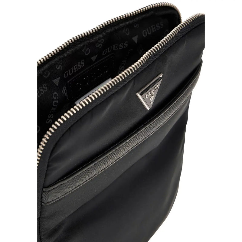 Guess Sac bandoulière homme Milano en polyester noir avec fermeture éclair argentée et plaque logo triangulaire L23cm