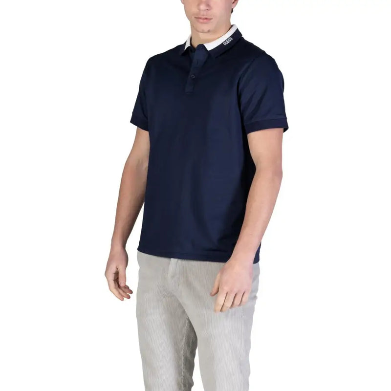 bleu marine Hugo Polo Boss à col blanc et logo de la marque sur la patte de boutonnage, en coton à manches courtes.