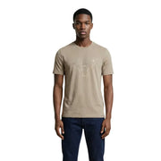 Chemise beige à manches courtes Guess hommes t-shirt avec un discret logo géométrique doré métallisé imprimé sur le devant