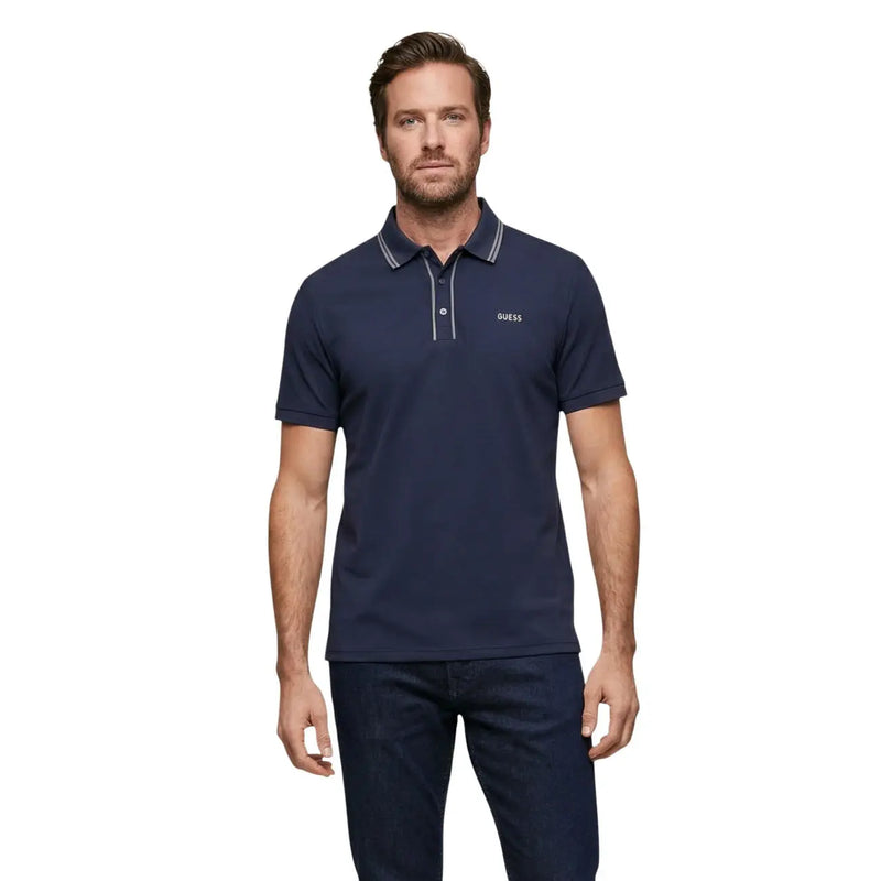 Navy blue Guess men polo shirt with white trim on collar and placket in cotton blend short sleeve design