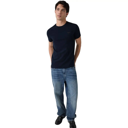 Guess T-shirt homme bleu marine en coton, coupe extra slim, manches courtes et col rond. t-shirt avec un logo brodé discret sur la poitrine gauche