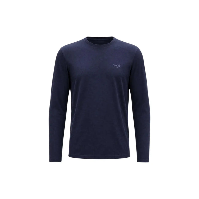 Guess T-shirt homme bleu marine slim fit en coton, manches longues, col rond et logo discret brodé sur la poitrine gauche.