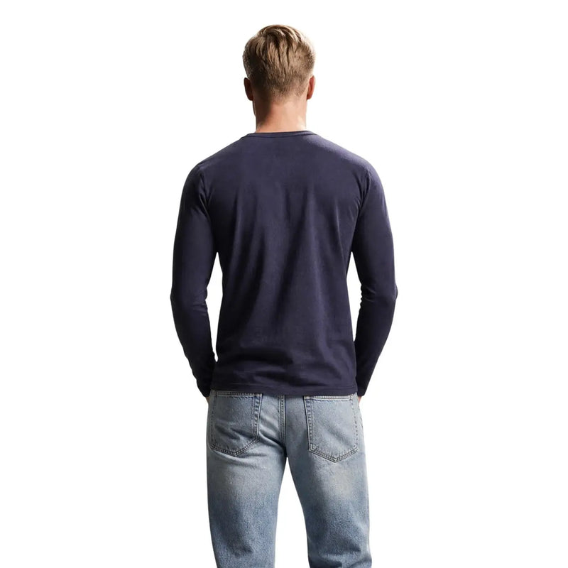 Guess T-shirt homme bleu marine en coton, coupe ajustée, à manches longues, confectionné dans un tissu en coton doux.