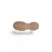 Tan rubber sole with chunky texture and embossed Guess branding on white women lace up textile sneakers fall winter