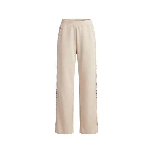 Guess Pantalon de survêtement beige à lacets pour femme, en mélange de modal, coupe large et détails discrets de texte vertical sur les coutures.